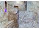 Standing shower with built-in shelf and tile surround at 5902 Sunset Dr, Indianapolis, IN 46239