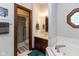 Well-appointed bathroom with a walk-in shower, jacuzzi tub, and vanity at 6010 Fawnwood Dr, Greenwood, IN 46143