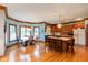 Bright kitchen and breakfast nook with beautiful windows and hardwood flooring at 6010 Fawnwood Dr, Greenwood, IN 46143