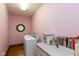 Practical laundry room with modern appliances and a unique octagonal window at 6010 Fawnwood Dr, Greenwood, IN 46143
