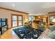 Inviting living room featuring hardwood floors and access to outdoor deck at 6010 Fawnwood Dr, Greenwood, IN 46143