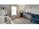Bright Bedroom featuring a crib, fish tank, and playful decor elements at 6615 School Branch Dr, Brownsburg, IN 46112