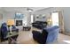 Comfortable living room with a fireplace, neutral walls, and comfortable furnishings at 6615 School Branch Dr, Brownsburg, IN 46112