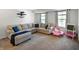 Bright and spacious living room featuring a large sectional sofa and natural light at 6615 School Branch Dr, Brownsburg, IN 46112