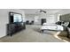 Expansive main bedroom with carpet, offering comfort and style with a large TV, and ample natural light at 6615 School Branch Dr, Brownsburg, IN 46112