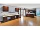 Spacious living area with desk, built-in shelving and storage, plus lots of light at 6958 W Brier Creek Dr, New Palestine, IN 46163