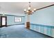 Spacious living room featuring comfortable carpet, and natural light at 6958 W Brier Creek Dr, New Palestine, IN 46163