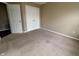 Bedroom with carpet floors and large closet at 7130 English Birch Ln, Indianapolis, IN 46268