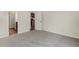 Bedroom view showcasing an open doorway with access to the kitchen area at 7170 Rose Hill Ave, Brownsburg, IN 46112