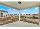 Covered patio overlooking backyard and neighborhood at 7170 Rose Hill Ave, Brownsburg, IN 46112