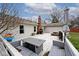 Relax on the backyard deck, which is ready for grilling and chilling at 7347 Blue Creek S Dr, Indianapolis, IN 46256