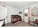 Neutral bedroom with hardwood floors, a crib, and a window at 7347 Blue Creek S Dr, Indianapolis, IN 46256