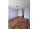 Spacious bedroom with hardwood floors, closet, and ensuite bath at 8160 Shores Edge Way, Indianapolis, IN 46237