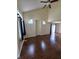 Spacious living room featuring hardwood floors, high ceilings, and ample natural light at 8160 Shores Edge Way, Indianapolis, IN 46237