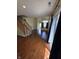 Inviting living room featuring hardwood floors, staircase, and natural light at 8160 Shores Edge Way, Indianapolis, IN 46237