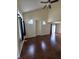 Spacious living room featuring hardwood floors, high ceilings, and ample natural light at 8160 Shores Edge Way, Indianapolis, IN 46237