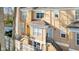 Charming townhouse exterior with brick and siding, featuring a covered entrance at 907 Junction Pl # 41907, Indianapolis, IN 46220