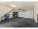 Clean garage interior featuring ample storage space, including shelving and a large door at 907 Junction Pl # 41907, Indianapolis, IN 46220