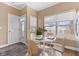 Breakfast nook features great light, views to the exterior, and seating for four at 907 Junction Pl # 41907, Indianapolis, IN 46220