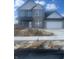 Two story home featuring a front-facing garage and large windows for plenty of natural light at 9403 Watson Way, Avon, IN 46123