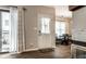 Welcoming entryway with sliding glass doors, hardwood floors, and neutral color palette at 9449 Maple Way, Indianapolis, IN 46268