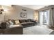 Stylish living room with a plush sectional sofa, neutral decor, and a bright, airy feel at 9449 Maple Way, Indianapolis, IN 46268