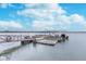 Private boat dock with covered lifts, providing convenient access to the water and secure boat storage solution at 102 Clarendon Dr # 514, Noblesville, IN 46062