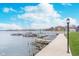 Picturesque lake view featuring well-maintained boat docks, and a grassy shoreline creating an inviting waterfront scene at 102 Clarendon Dr # 514, Noblesville, IN 46062