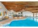 Spacious indoor pool area with a light wood ceiling at 102 Clarendon Dr # 514, Noblesville, IN 46062