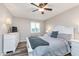 Comfortable bedroom with a ceiling fan, closet, and natural light at 102 Clarendon Dr # 514, Noblesville, IN 46062