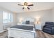 Comfortable bedroom with a ceiling fan, closet, and natural light at 102 Clarendon Dr # 514, Noblesville, IN 46062