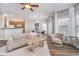 Spacious living area with hardwood floors, fireplace, and access to the kitchen and dining room at 1160 Falcon Rdg, Carmel, IN 46280