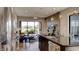 Open-concept kitchen with granite countertops and views into the living area at 13395 Vickery Ridge Dr, Fishers, IN 46037