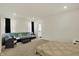Bedroom featuring carpet floors and large windows and seating at 1347 Shaw Ln, Shelbyville, IN 46176