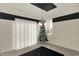 Dining room with modern lighting, large window, and neutral color palette at 1347 Shaw Ln, Shelbyville, IN 46176