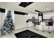Open-concept living space with a dining area, kitchen, and breakfast bar at 1347 Shaw Ln, Shelbyville, IN 46176