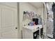 Utility room featuring a modern washer and dryer, with a furnace in the back at 1347 Shaw Ln, Shelbyville, IN 46176