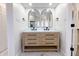 Bright bathroom with double vanity with marble countertop and walk-in shower view at 1351 Sullivans Rdg, Zionsville, IN 46077