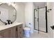 Modern bathroom featuring vanity, toilet, and walk-in shower at 1351 Sullivans Rdg, Zionsville, IN 46077