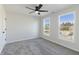 Spacious bedroom with new carpet, ceiling fan and lots of natural light at 1351 Sullivans Rdg, Zionsville, IN 46077