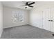 Bright bedroom featuring new carpet, neutral walls, and window at 1351 Sullivans Rdg, Zionsville, IN 46077