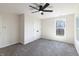 Bright bedroom featuring new carpet, neutral walls, and walk-in closet at 1351 Sullivans Rdg, Zionsville, IN 46077