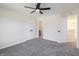 Bright bedroom featuring new carpet, neutral walls, and en-suite bathroom at 1351 Sullivans Rdg, Zionsville, IN 46077
