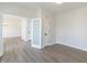 Neutral room with light vinyl floors and open door at 1351 Sullivans Rdg, Zionsville, IN 46077