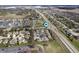 An aerial view of a large residential neighborhood with homes, roads, and mature trees at 1568 Brookfield Cir, Franklin, IN 46131