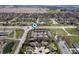 An aerial view of a suburban neighborhood with tree lined streets, condos and single Gathering homes at 1568 Brookfield Cir, Franklin, IN 46131