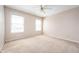 Bright bedroom with neutral walls and two large windows at 1568 Brookfield Cir, Franklin, IN 46131