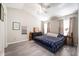 Spacious primary bedroom with vaulted ceiling, neutral walls, and large windows for natural light at 1568 Brookfield Cir, Franklin, IN 46131