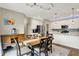Open concept dining area next to the kitchen features a table for six and nice decor at 15752 Matthews Ln, Noblesville, IN 46060