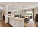 Open kitchen with view to dining area and living room at 15752 Matthews Ln, Noblesville, IN 46060